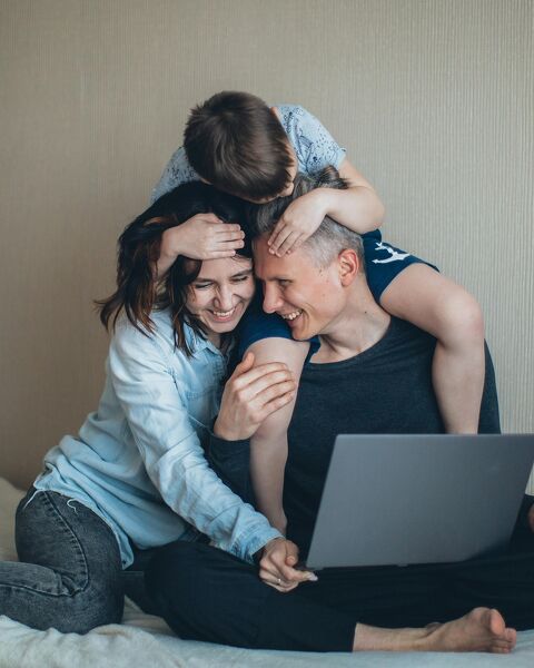 Family using laptop for mortgage planning